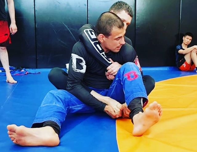 Wim Deputter rolling at the BJJ Globetrotters Zen Camo in Talinn Estonia